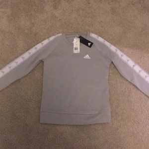 Grey, women’s adidas sweatshirt.
